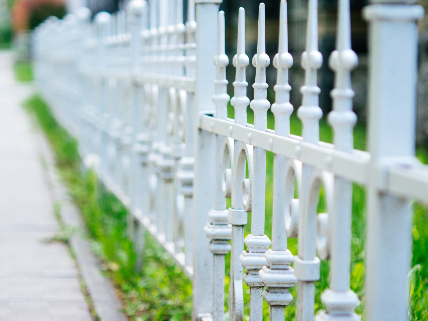 American dream, white fence near the government building.